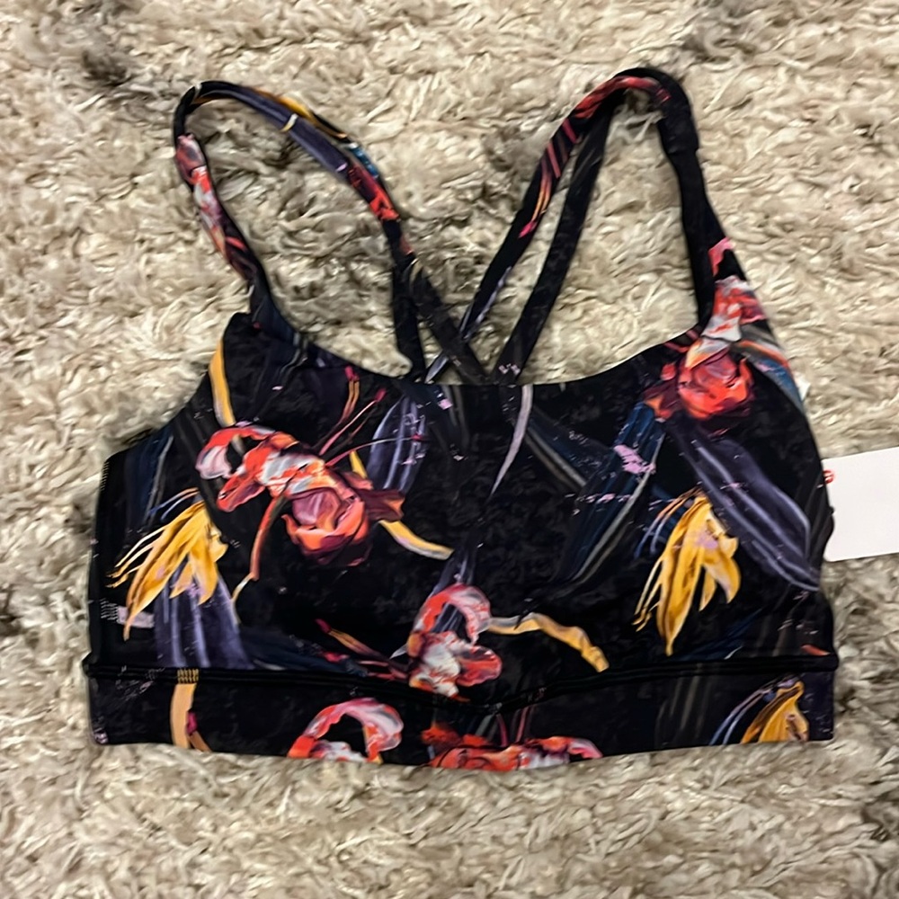 Lululemon energy bra. Size 4. New with tags. Veiled Floral Black multi.